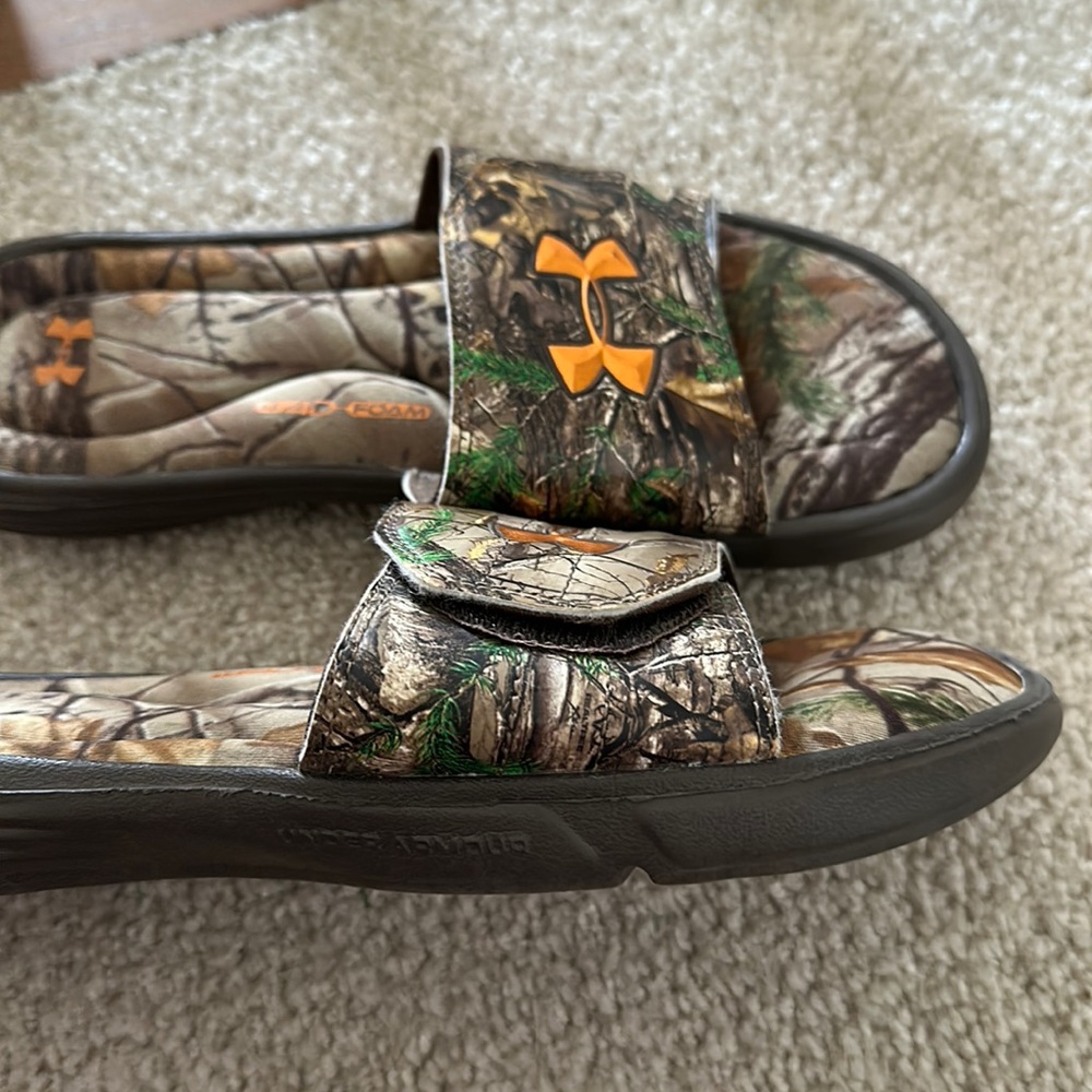 Under Armour camo slides. Never worn. Size 7.